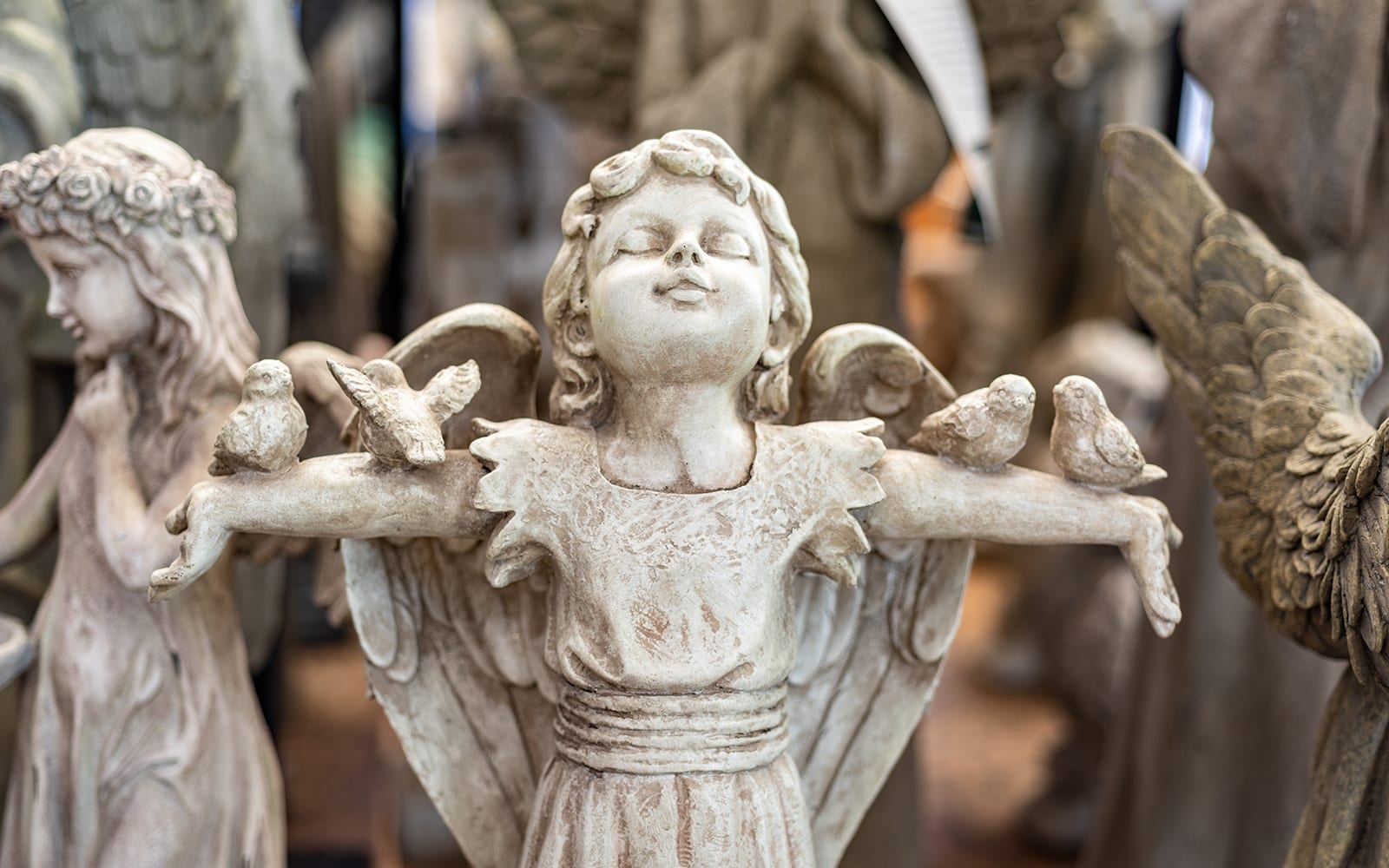 Winged Angel with Birds Statue