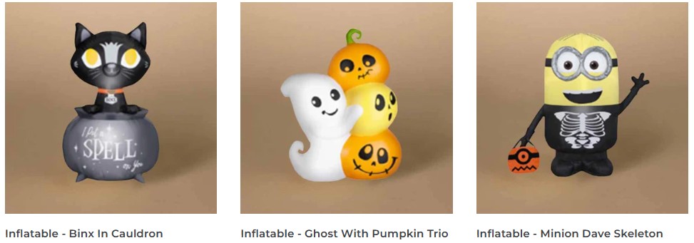 Three Halloween inflatables: a black cat with big eyes sitting in a cauldron, a white ghost with three stacked pumpkins, and a Minion dressed as a skeleton holding an orange pail.